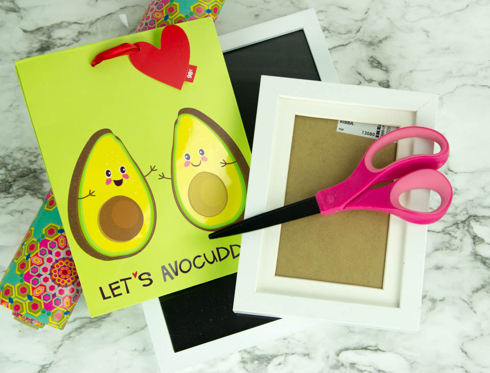 DIY Wall Art made from gift wrap cheap but oh so awesome!