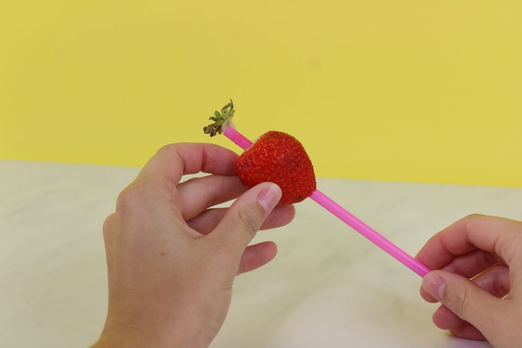 Use a Straw To Remove Stems From Strawberries