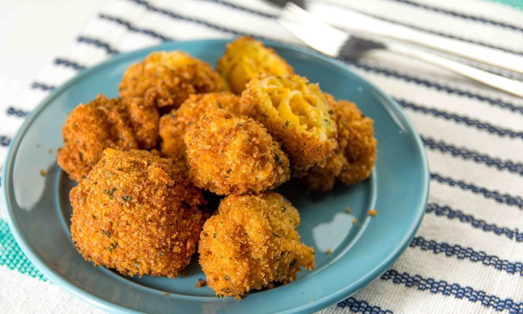 A plate of fried mac and cheese bites