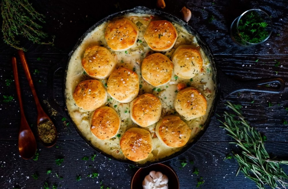 Delicious cast iron chicken pot pie with biscuits on top