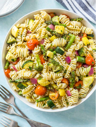 Roasted vegetables and pasta tossed with Italian dressing