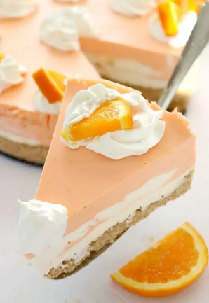 A delicious nilla cookie crust with no bake orange creamsicle cheesecake a summer dessert