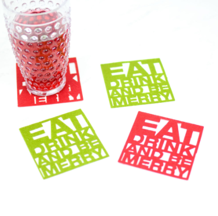 Felt Christmas coasters that says Eat Drink and be Merry