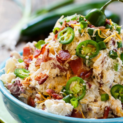 Jalapeno popper potato salad, made with cream cheese, bacon, and lots of jalapeno peppers