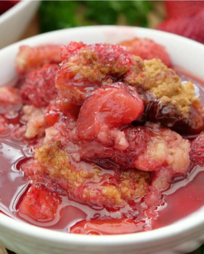 A delicious strawberry cobbler loaded with delicious fresh strawberries, then topped with a crunchy cake-like topping