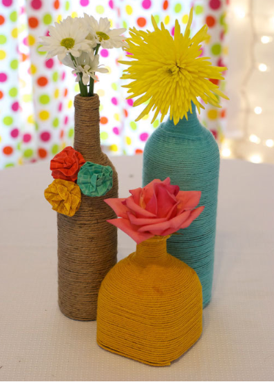 DIY Wrapped Bottles a super cute and colorful wedding centerpiece and decor