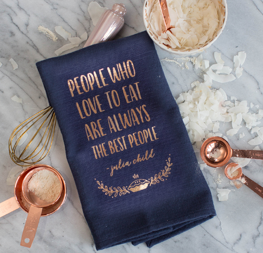 Rose gold tea towel with a text on it saying people who love to eat are always the best people