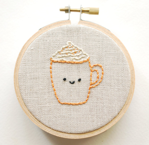 A cute pumpkin spice latte mug pattern