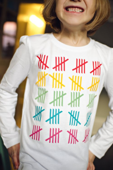 tshirt with 100 tally marks painted on