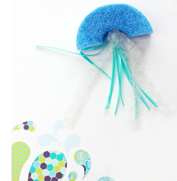 Pool noodle jellyfish with teal plastic lacing
