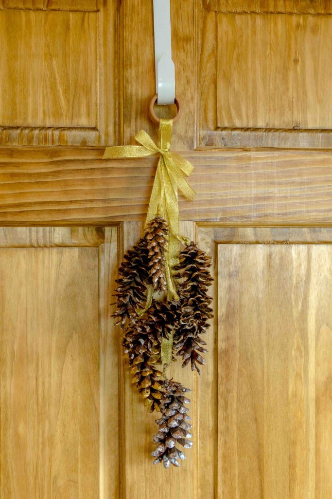 diy pine cone wreath and ornament for the fall and winter seasons