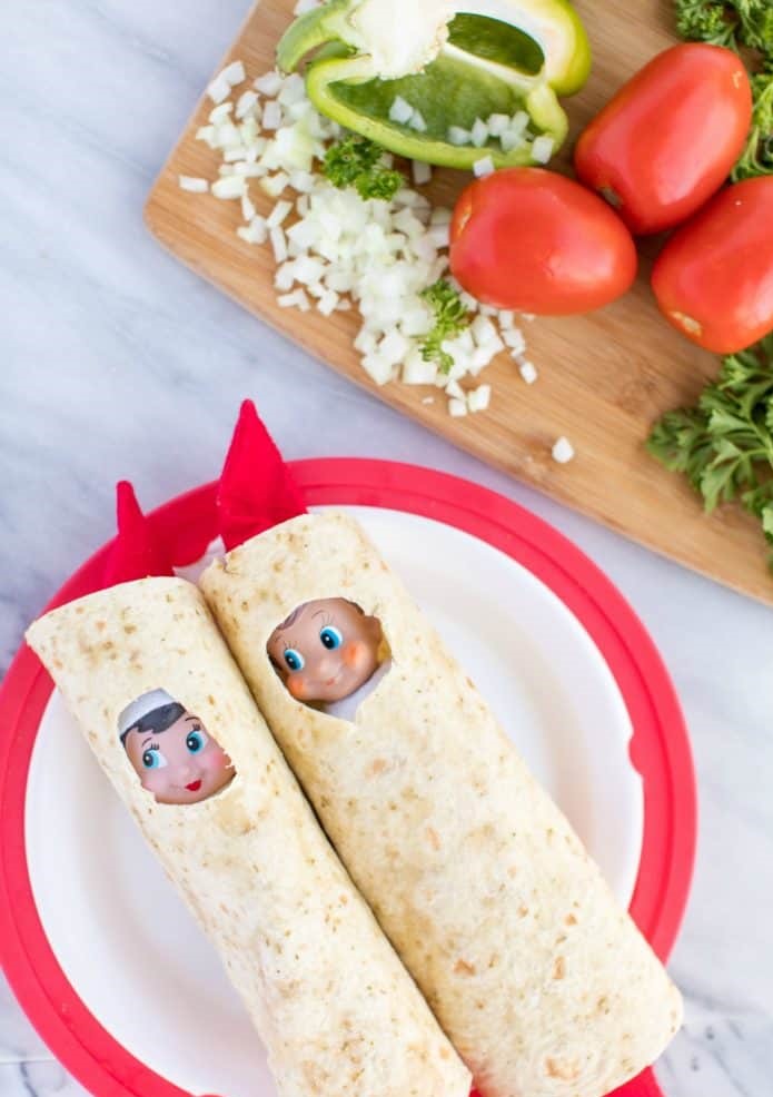 elf on the shelf becomes a delicious and spicy burrito