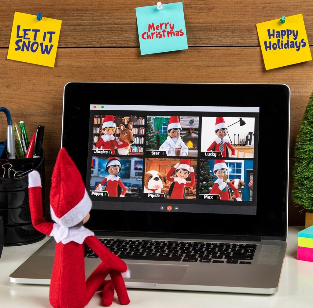 elf on the shelf north pole having virtual meeting with friends 