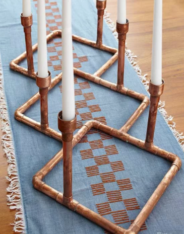 Beautiful copper candelabra perfect for your mantel or dining table