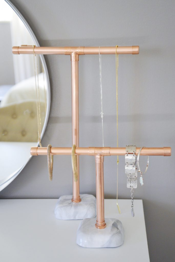 Copper pipe jewelry stand with marble vase