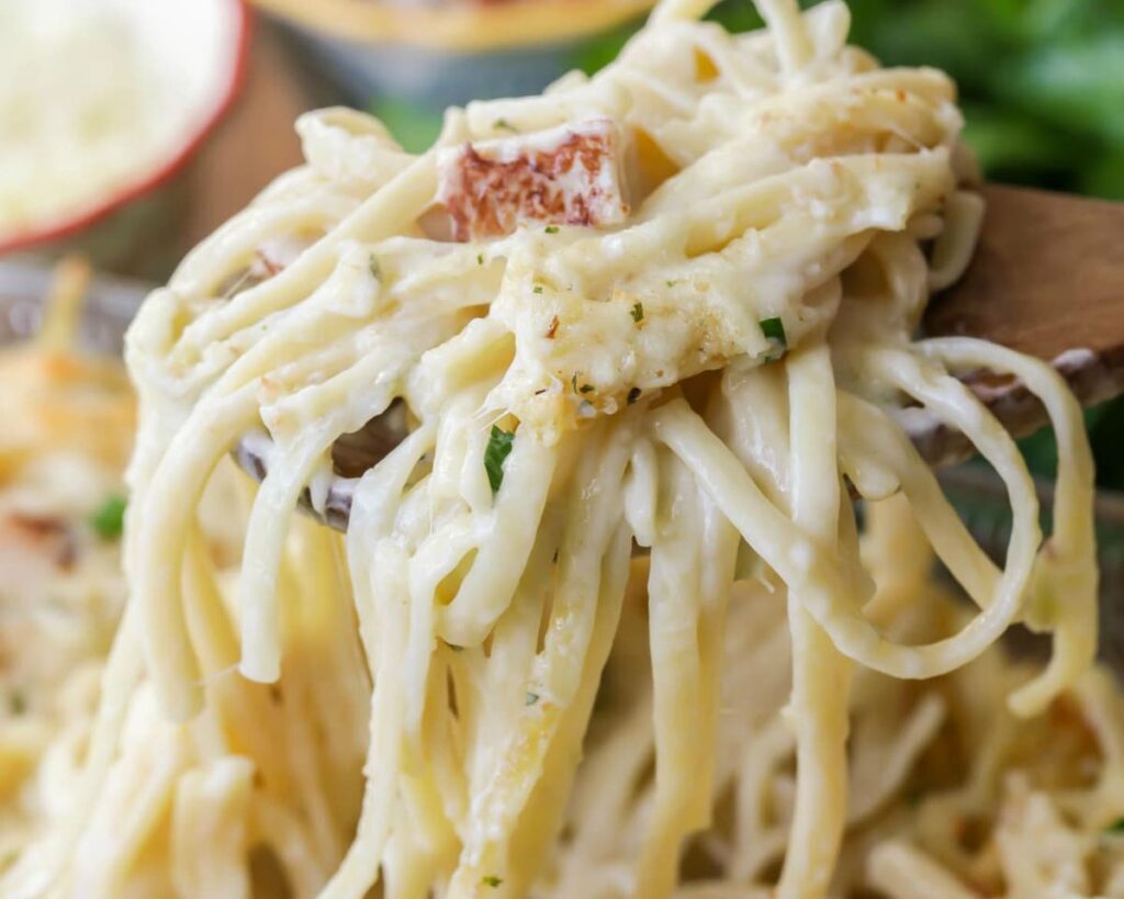 Creamy leftover turkey tetrazzini sprinkled with cheese and bread crumbs on top