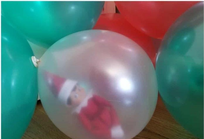 elf on the shelf is inside a balloon