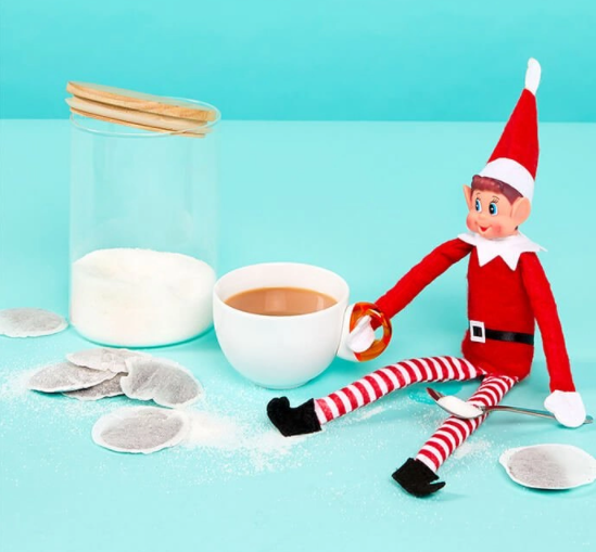 elf on the shelf is making an afternoon tea