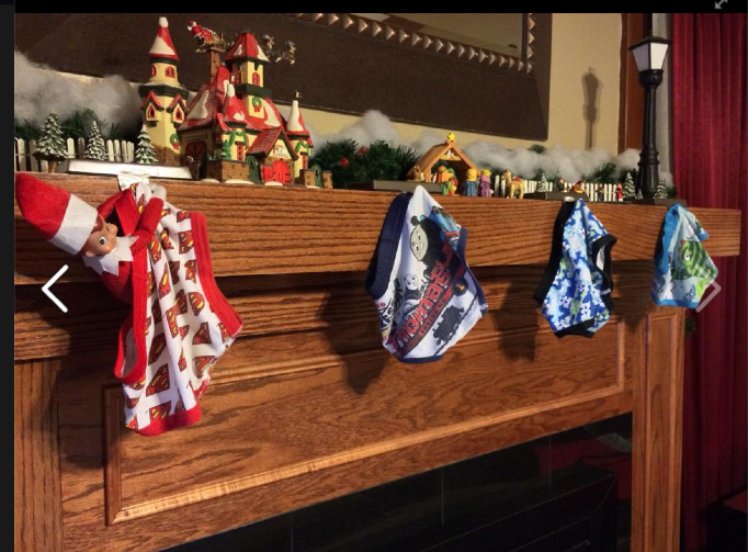 ELF ON THE SHELF SWAPPING STOCKINGS