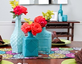 turquoise colored glass bottles centerpiece