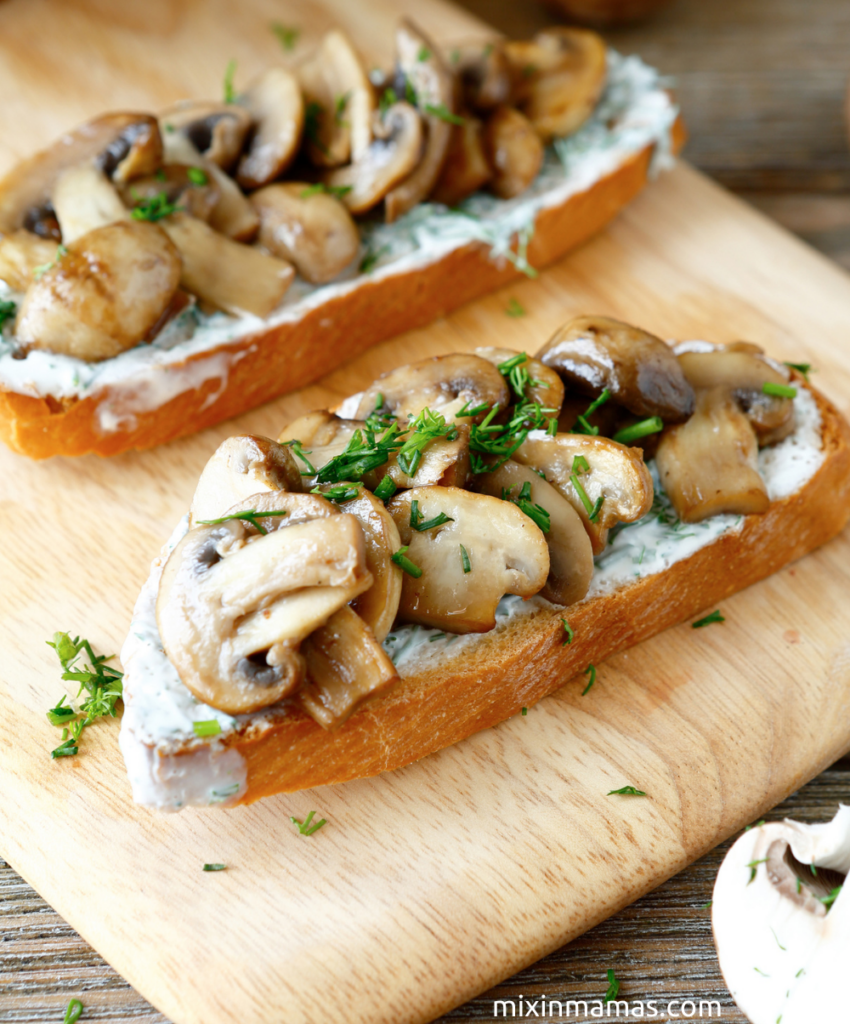 Bruschetta topped with delicious mushroom and with herbed cheese 