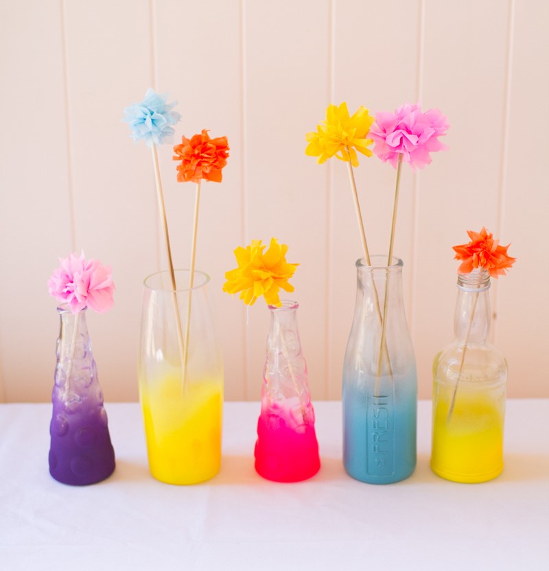 Neon colored ombre spray painted bottles