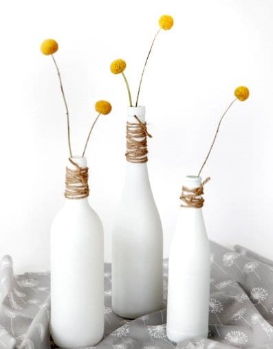 Twine wrapped bottles centerpiece