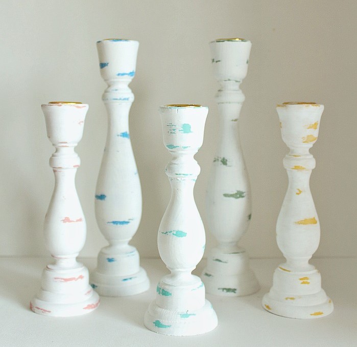 Colourfully-distressed mismatched candlesticks