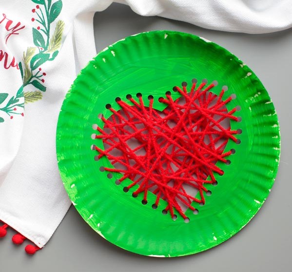Grinch’s Heart Craft using paper plate and yarn fun and adorable project