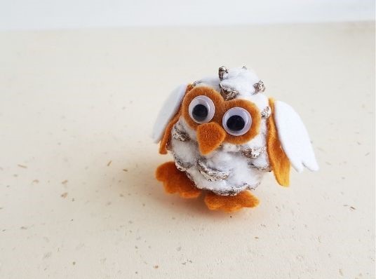 adorable pinecone snowy owl 