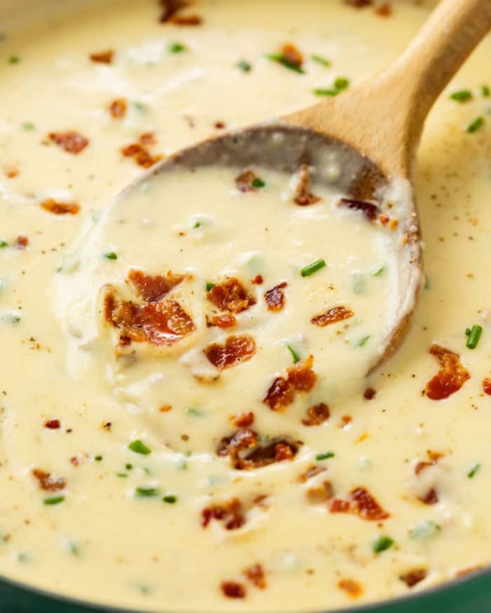 Baked Potato Soup loaded with bacon and chives, cheddar cheese, sour cream