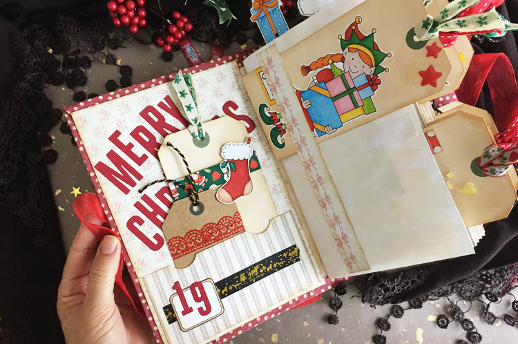 Junk journal with a Christmas doddle printed on some of the pages
