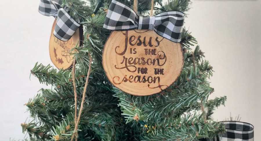 wood burned ornaments with text saying Jesus is the reason for the season