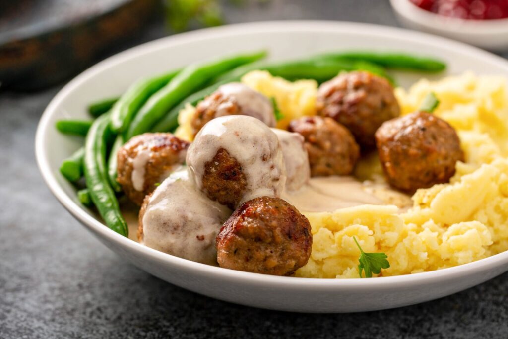 Swedish Meatballs with Creamy Sauce Recipe made with ground beef, pork, breadcrumbs and a savory cream sauce for a healthy dinner