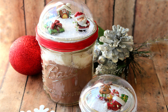 mason jar snow globe with hot cocoa mix teens will surely enjoy