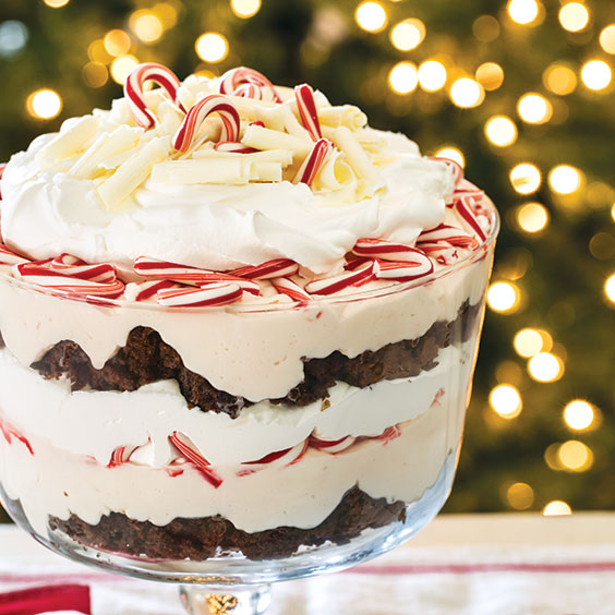 Peppermint trifle garnished with chocolate curls and candy canes