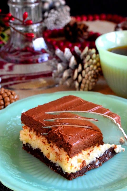 triple-layered square that includes both chocolate and coconut
