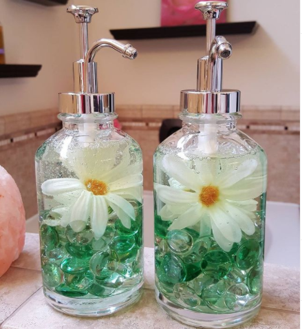 Hand soap glass dispenser with glass gems, flowers and soft soap hand soap all from the dollar tree