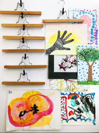 Kids art gallery using hangers