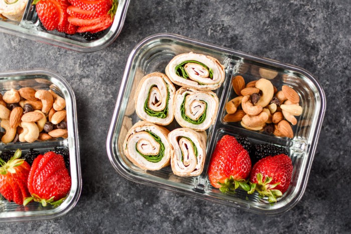 Easy Turkey Pinwheels Meal Prep served with strawberry and cashews