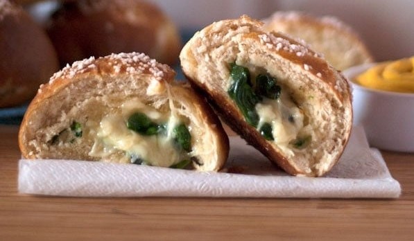 Brie and spinach stuffed pretzel rolls