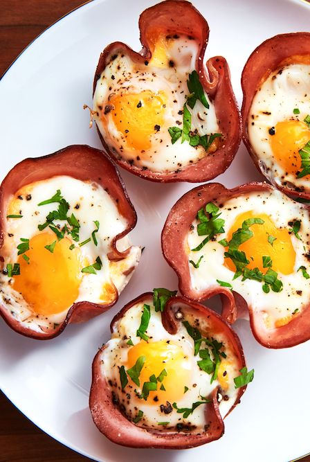 Ham and cheese egg cups garnish with parsley
