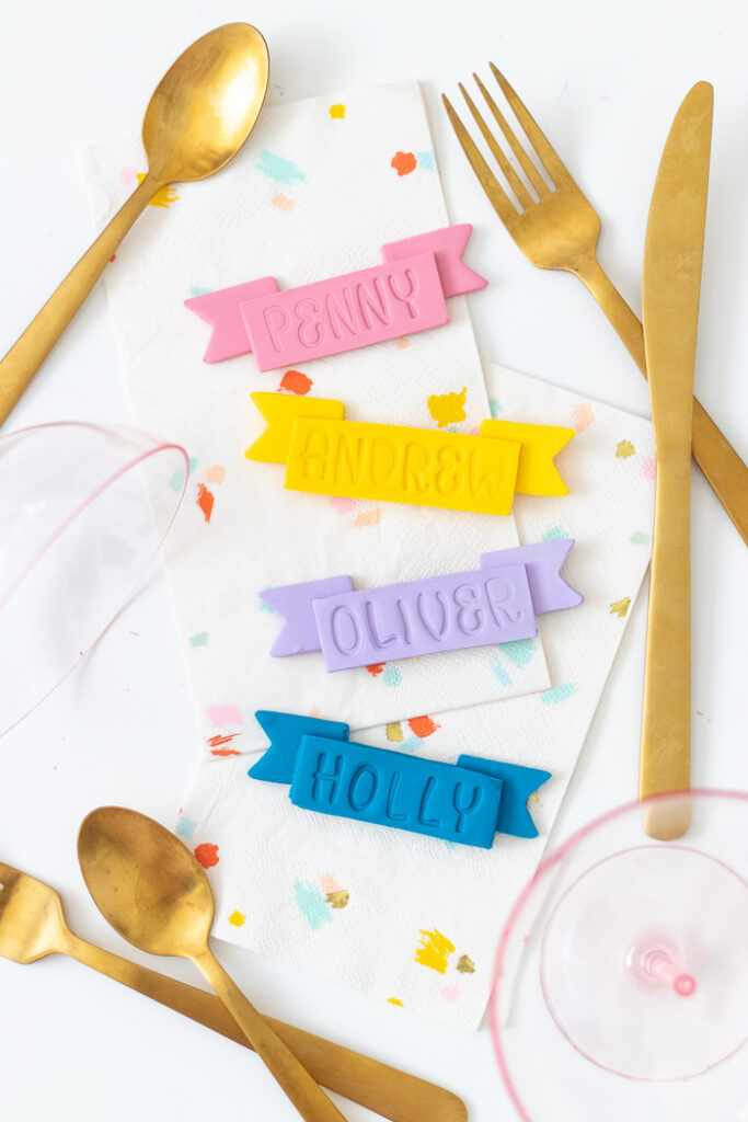 colorful clay ribbon place cards perfect for bridal shower