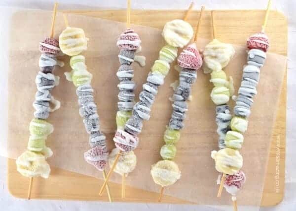 frozen fruit kabobs perfect for helping the kids cool down during the hot summer weather