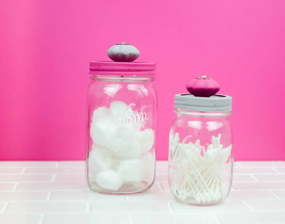DIY painted mason jar organizers filled with cotton balls and q tips