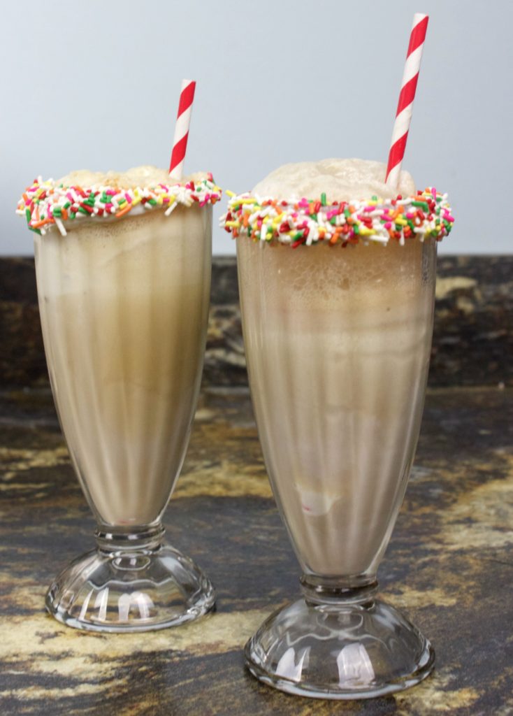 Colorful Root Beer Floats with sprinkle dipped cups perfect for summer