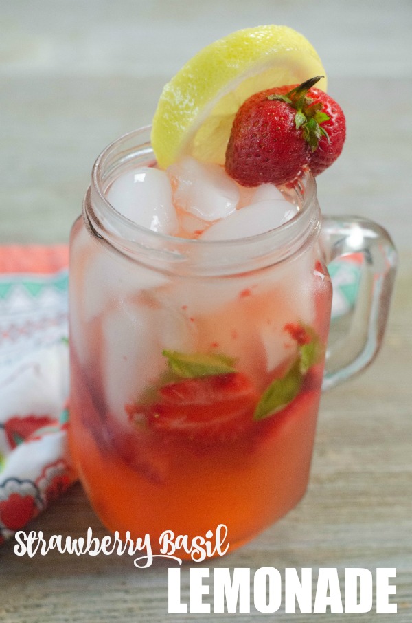 Strawberry Basil Lemonade garnished with a slice of lemon and a strawberry perfect for summer