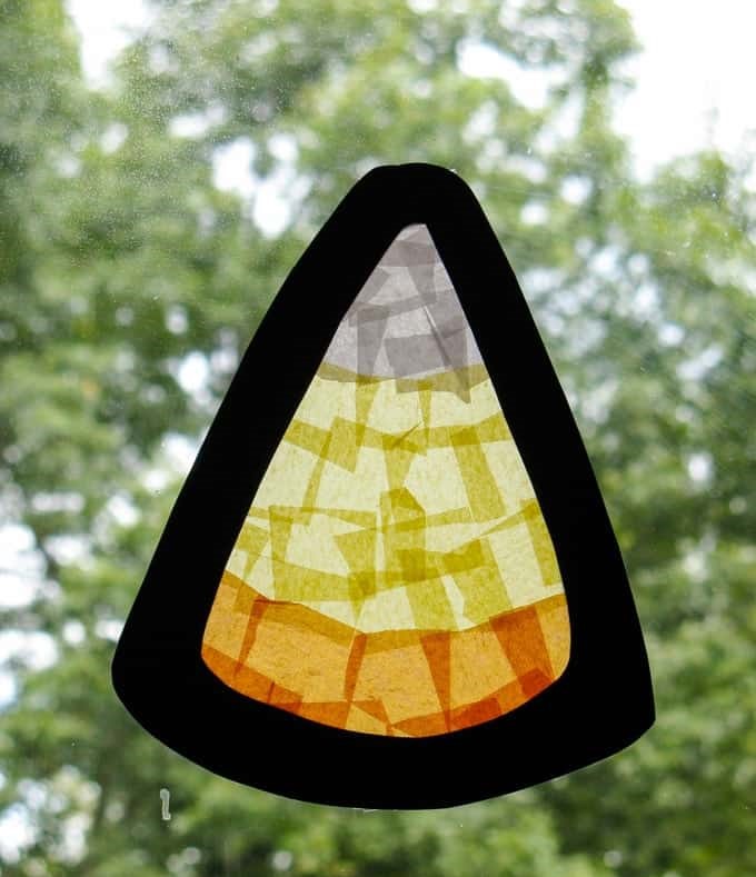 candy corn sun catcher hanging in the window