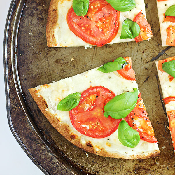 Caprese Tortilla Pizzas with fresh basil, tomatoes, ricotta, mozzarella, and tortillas