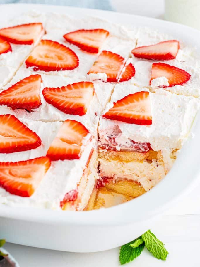 No-Bake Strawberry Tiramisu dessert has layers of ladyfingers, whipped cream and fresh strawberries